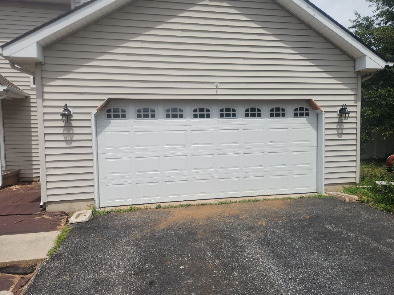 Door that has gone through a garage door lubrication